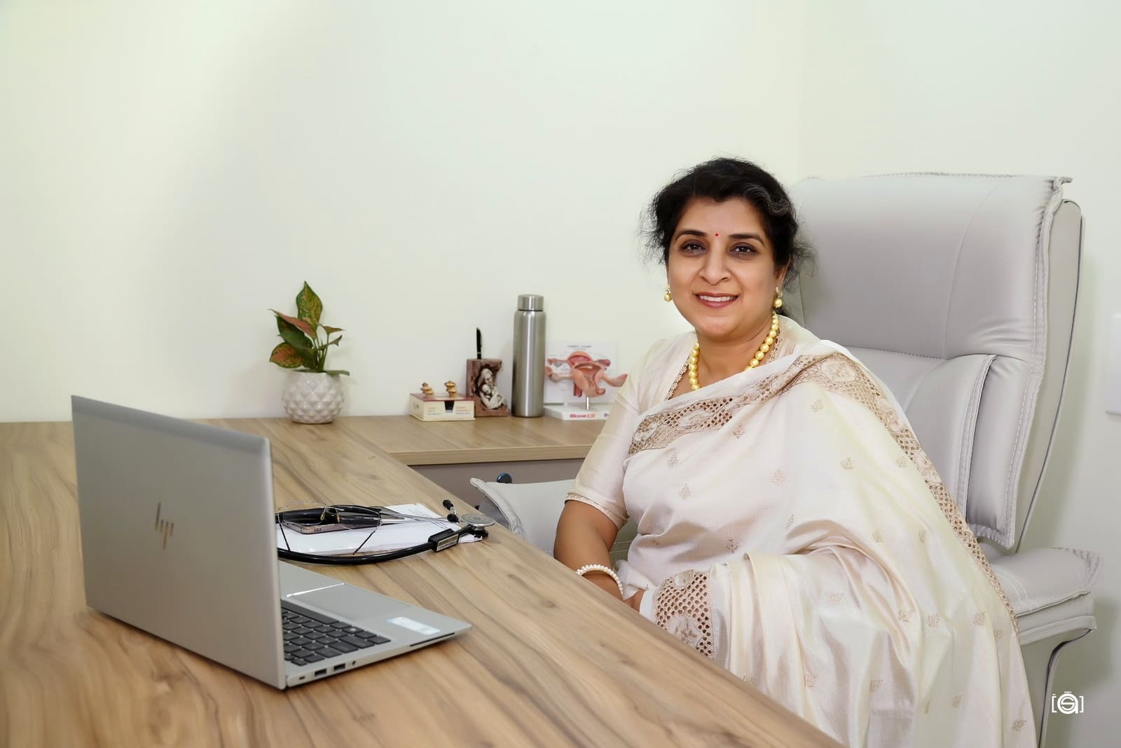 Dr. Shweta Agarwal at her desk at Aansh Hospital & IVF Center